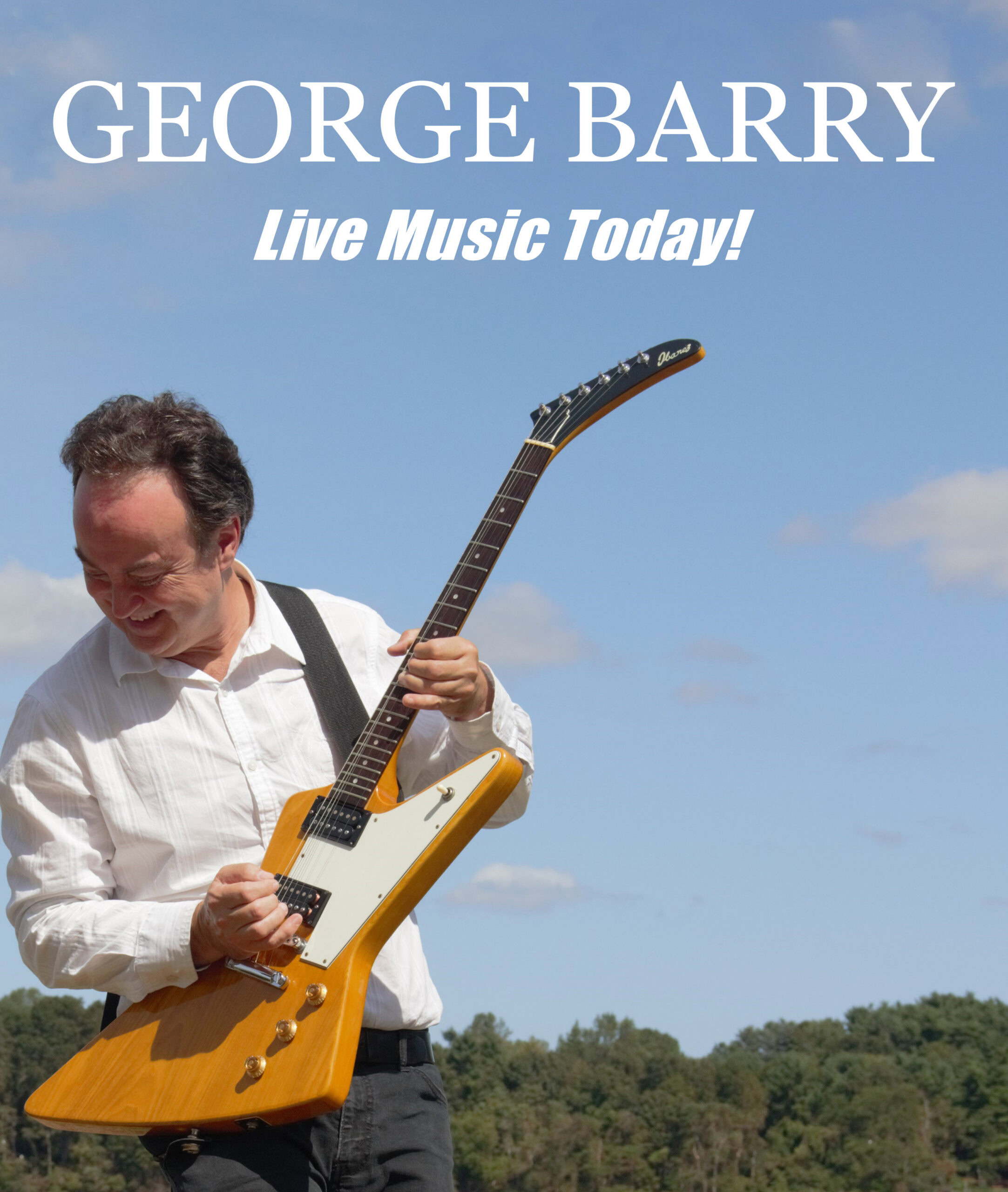 Live music performance by George Barry at Pindar Vineyards, outdoor setting, sunny day, vineyard background.