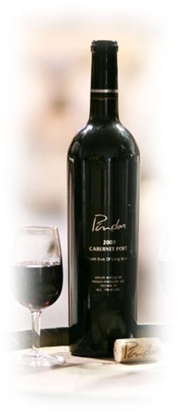Bottle of Pindar Cabernet Port wine with a glass of red wine beside it.